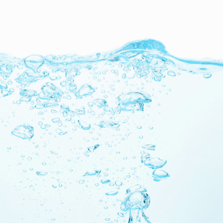 Fundal albastru deschis cu bule care se ridică, simbolizând modul Degas în aparatele de curățare cu ultrasunete ASONIC.